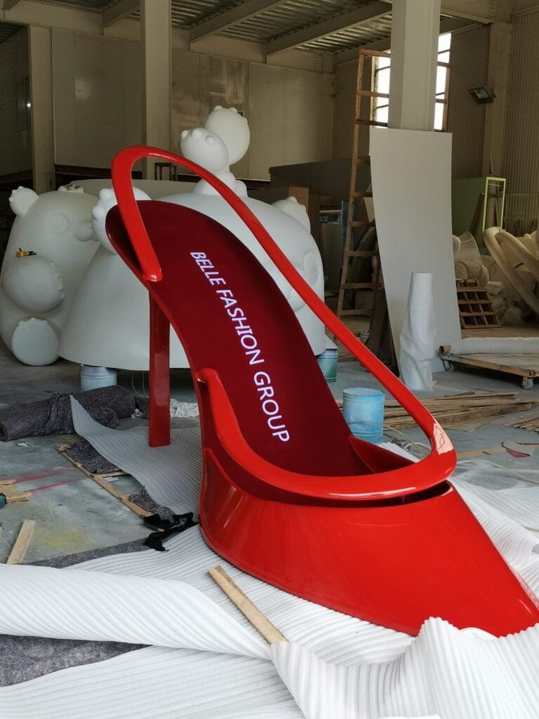 "Luxury Red High-Heel Display Sculpture" "Custom Fiberglass Shoe Prop" "Creative Retail High-Heel Sculpture"